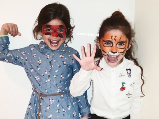 Kinderen geschminkt als tijger